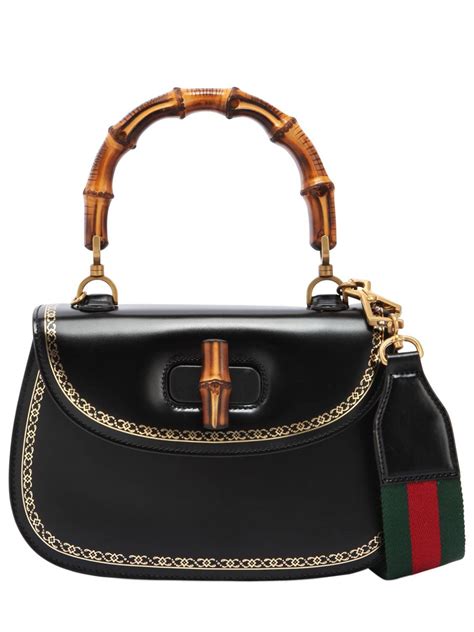 black gucci bag with bamboo handle|Gucci monogram bamboo handle bag.